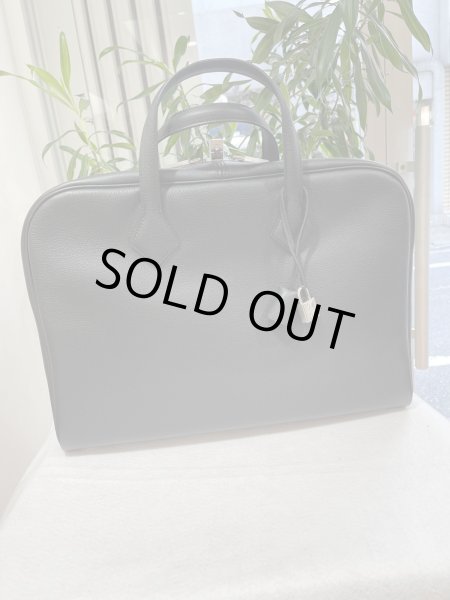 画像1: 【新品】【未使用品】HERMES エルメス ヴィクトリア 2 12H 40 トリヨンノビーヨ ブラック シルバー金具 T刻印 ビジネスバッグ ブリーフケース ハンドバッグ 書類バッグ トートバッグ メンズ レディース ブランド 本革 レザー カーフ 黒 レア プレゼント ギフト バック (1)